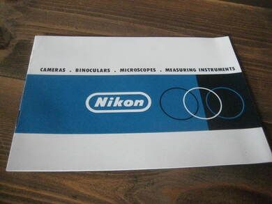 Reklamesak, NIKON, 60 tallet. Med bilder av alle modeller