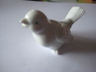 Eldre japansk porselens fugl, ca 10 cm lang.
