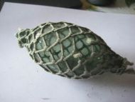 Meget gammel kavlkule med tupp i begge endser liten skade på seis se bildet fra slutten på 1800 tallet Oval ca 12 cm i diameter