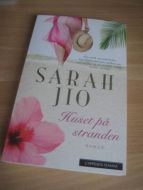 JIO, SARAH: Huset på stranden. 2013.