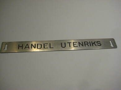 Pent skilt fra 50 tallet, brukt i bibliotek, noe for deg? HANDEL, UTENRIKS.