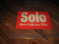 Str&oslash;kent og ubrukt plastnett med reklame for SOLO 70-80 tallet