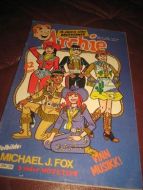 1986,nr 009, ARCHIE. Helsides bilde av  MICHAEL FOX på baksida.
