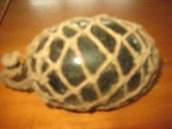 Gammel kavlkule brukt ved garnfiske i eldre tider Dette er den tykke kula som er sjelden Lys grønn pen seis Dette er kule nr 17