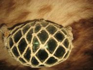 Gammel kavlkule fra tidleg 1900 brukt ved garnfiske i gamle dager Lys grønn tykk utgave som er den sjedneste dette er kule nr 45