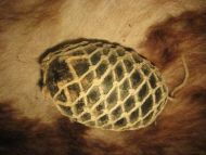 Gammel kavlkule brukt ved garnfiske i gamle dager Lys grønn dette er kule nr 43