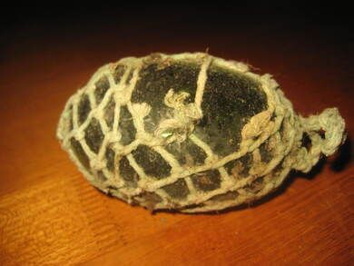 Gammel kavlkule brukt ved garnfiske i gamle dager Ble brukt til &aring; halde garnet oppe i sj&oslash;en tidleg 1900 Dette er kule nr 5