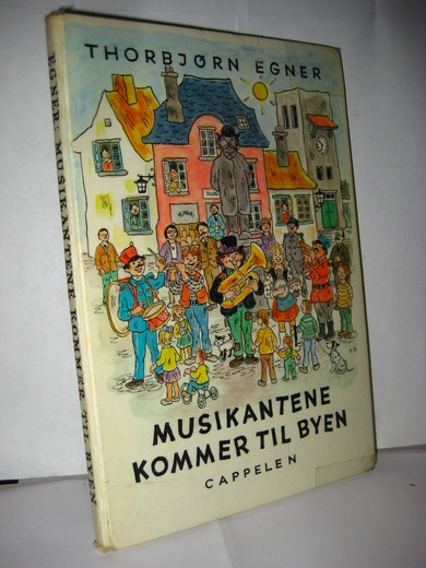 EGNER, TORBJØRN: MUSIKANTENE KOMMER TIL BYEN. 1. opplag 1978.