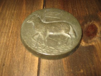 Arbeid i messing ca 8 cm i diameter