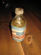 Flaske med innhold, kobra mal, liten flaske, 60 tallet. 