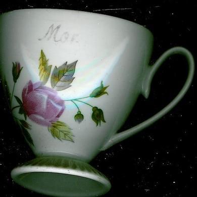 Gammel kopp med tekst 