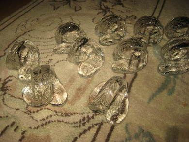 Lot med serviettringer i glass selges samla