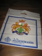 Plastnett med reklame fra Tiedemanns Tobaksfabrik, 60 tallet.