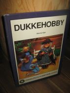 Kjær, Wenche: DUKKEHOBBY. 1991.