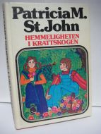 St. John: HEMMELIGHETEN I KRATTSKOGEN. 1977.