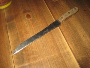Eldre kniv med trehandtak, A.M. BRONN, RUSTFRI. 50-60 tallet.