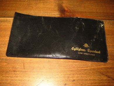 Reklamesak fra Sykkylven Sparebank, for oppbevaring av sjekkhefte, 60-70 tallet. 