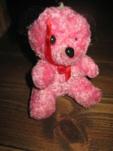 Rosa teddy, ca 12 cm høg.