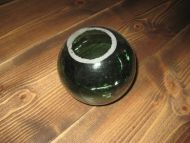 Kavlkule i mørk greønn glass saga av slik at den kan brukes til noe spesiellt