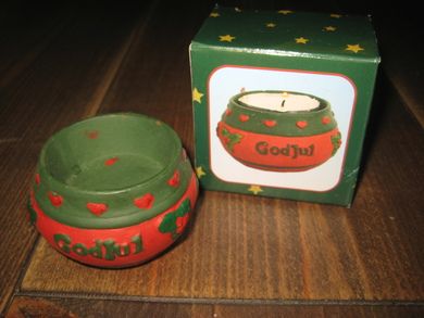 Liten keramikkkrukke med tekst: God Jul