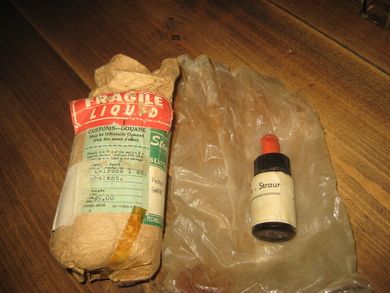 Pakke med en flaske fra Stansburg Chemical Co Washington 1964