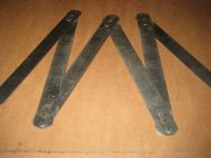 Gammel metersmål i metall……