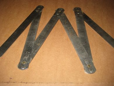 Gammel metersmål i metall……