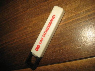 Flaske åpner med UNI STOREBRAND reklame 80 tallet