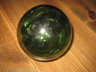 Meget pen rund kavlkule brukt ved garnfiske i gamle dager Uten seis Ca 10 cm i diameter Tidleg 1900 Mørk grønn