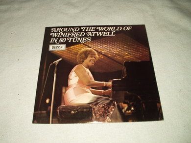 AROUND THE WORLD OF WINIFRED ATWELL IN 80 YUNES