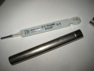 Eldre tempraturmåler med reklame fra E H SLYNGSTAD Aalesund 40 tallet