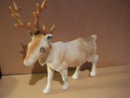 Reinsdyr i plast tekkt med 