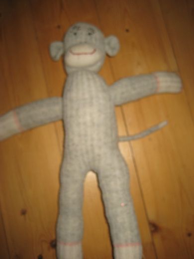 Koseape av noe nyere utgave ca 45 cm høg