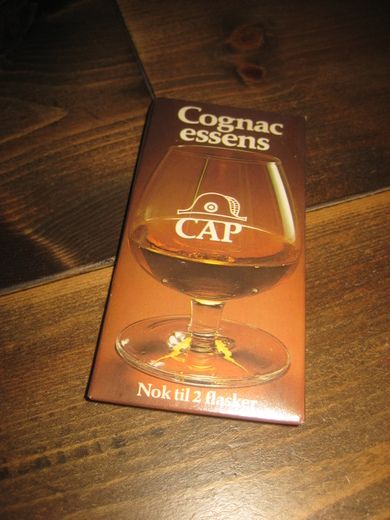 Uåpna pakke med ubrukt innhold Cognac essens fra Tomten 60-70 tallet