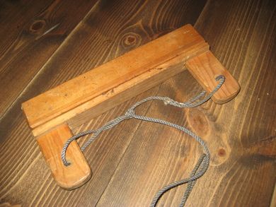 Gammel lineklave maritimt redskap for å henge fra seg en line