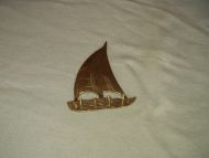 Lite oppheng for klær laga i messing