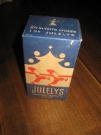 Strøken eske med ubrukt innhold, 24 kulørte vridde JULELYS fra Christian Holter, Oslo, 