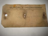 Sendelapp med reklame fra SUNDALS TREVAREFABRIKK, NORDALSFJORD. 60 tallet.