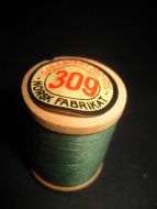 Ubrukt trådsnelle i tre 60 tallet denne har grønn tråd