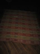 Gammelt velbrukt teppe fra tidleg 1900