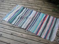 Eldre golvteppe, 140*65 cm stort.