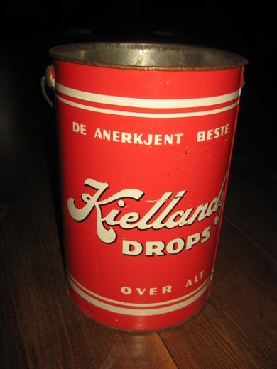 Dropsboks uten lokk, Kielland DROPS, ca 16 cm i diameter, 25 cm høg. 