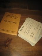Livspolise kviteringer i mappe, 50 tallet. 