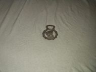 Flaskeåpner i tinn med vikingskip med tekst 