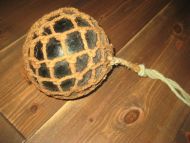 Kavlkule brukt ved garnfiske i gamle dager Fra forige århundreskifte Ca 14 cm i diameter mørk grønn