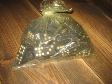 Stor pose med dominobrikker