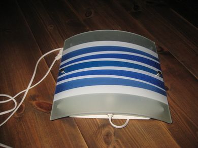 Stilig vegglampett 60 tallet?