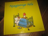 REY: Nysgjerrige Nils drømmer. 2002. 