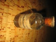 Flaske med noe innhold Trøskesaft fra Nordfjoreid Apotek 50 tallet