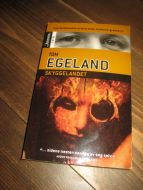 EGELAND: SKYGGELAANDET 1993